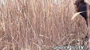 Japanese Schoolgirls Caught Taking A Warm Pissing In The Open