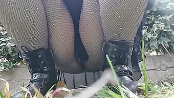 Watch A Woman In Fishnet Stockings Expose Her Clit For Your Pleasure